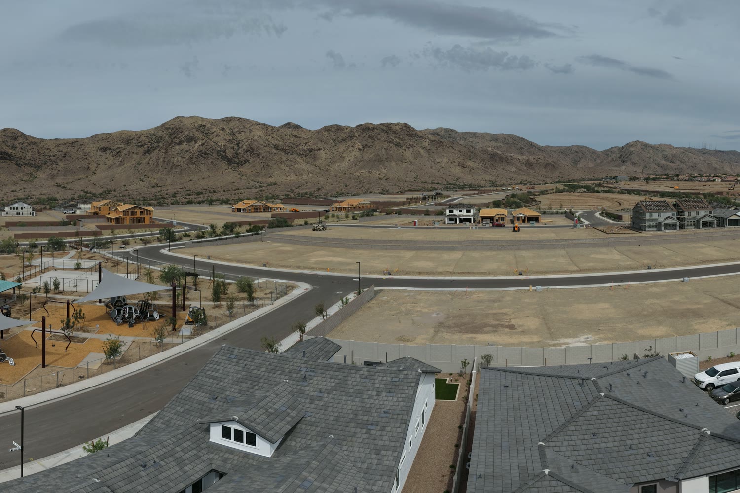 South Mountain rising behind new homes under construction at Upper Canyon