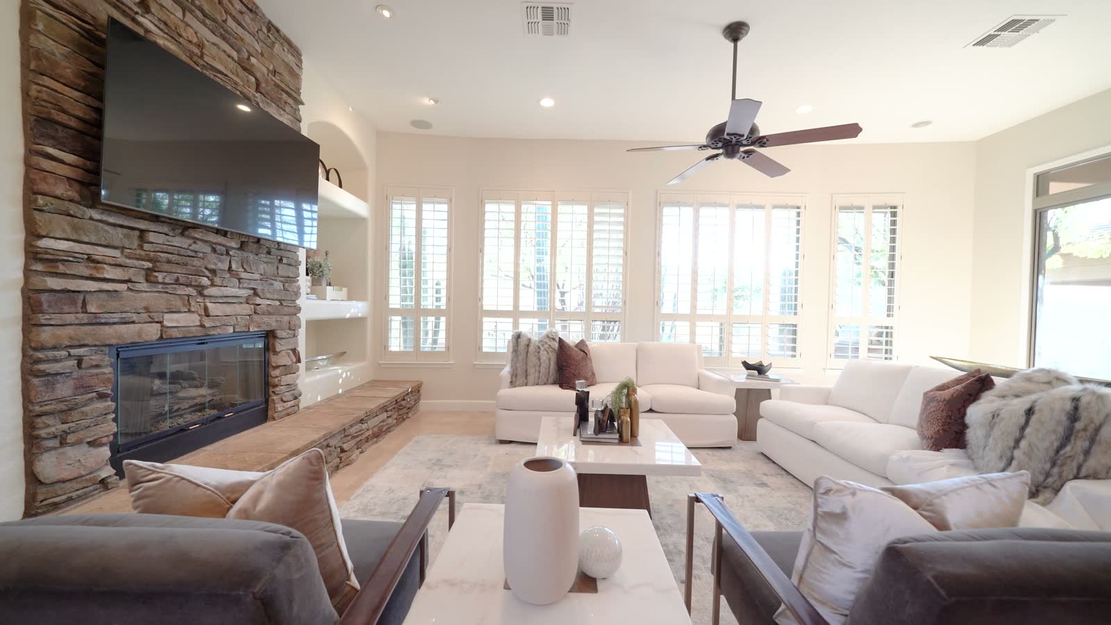 An open-plan kitchen with an island and cabinetry